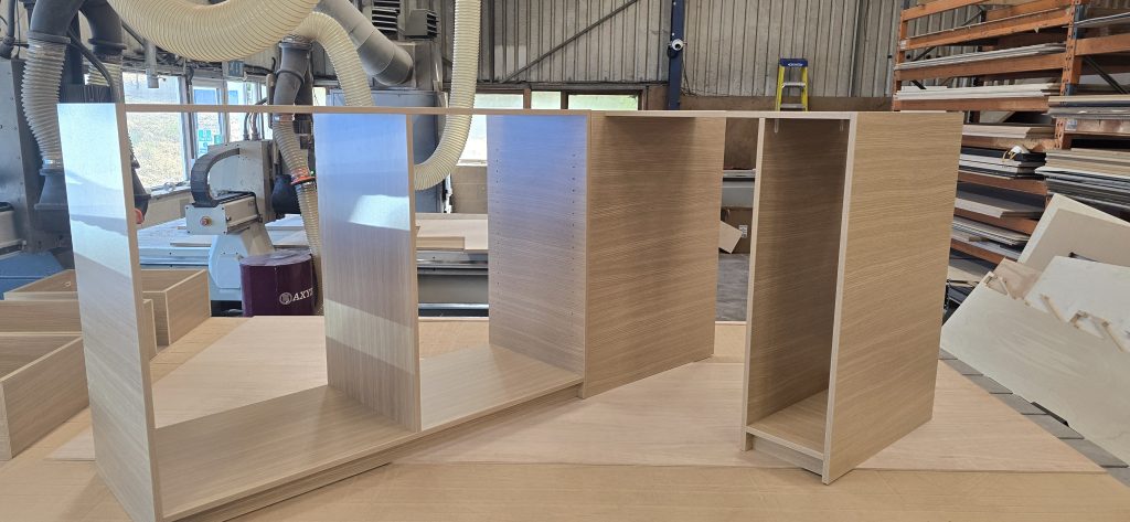Oak laminated cabinet carcasses in the workshop